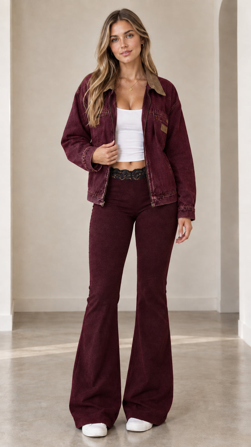 Model wearing burgundy zip-up jacket with brown corduroy collar and matching burgundy pants