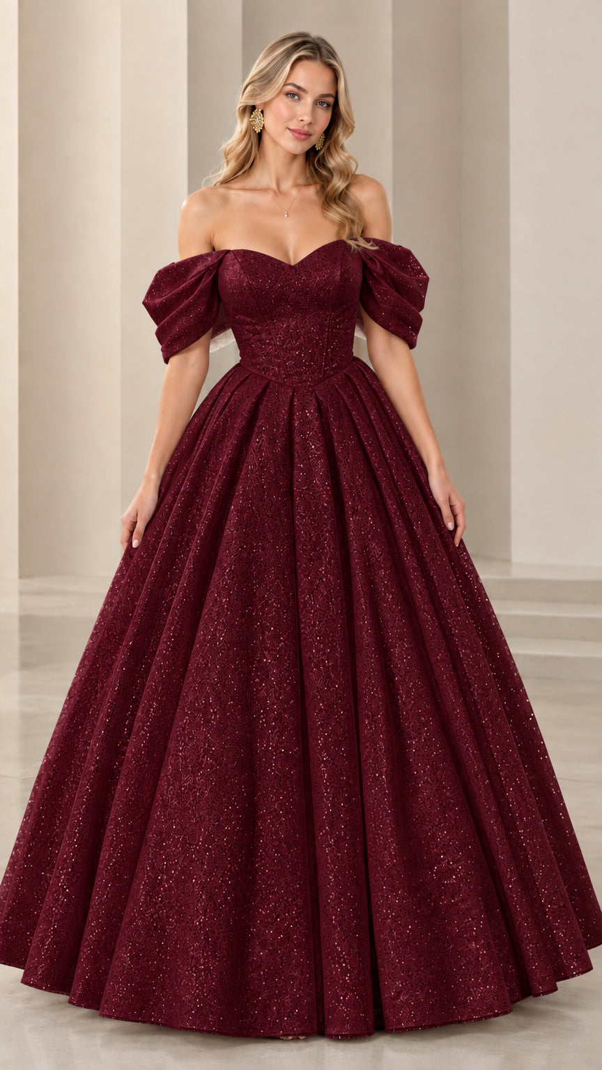 Model wearing burgundy red glitter ball gown with sweetheart neckline and full skirt