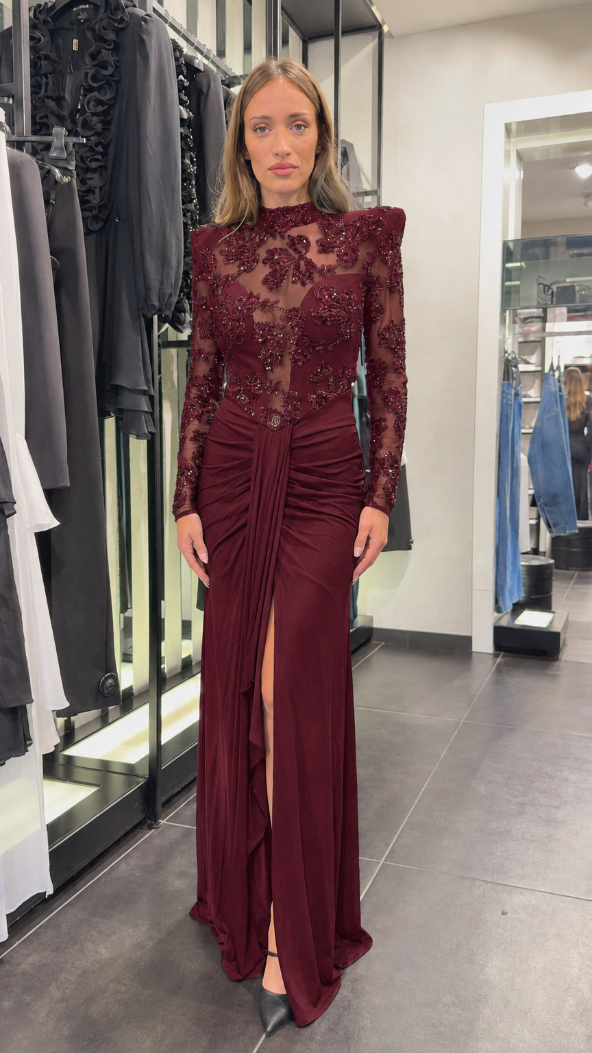 Front view of burgundy floral embellished long sleeve maxi dress