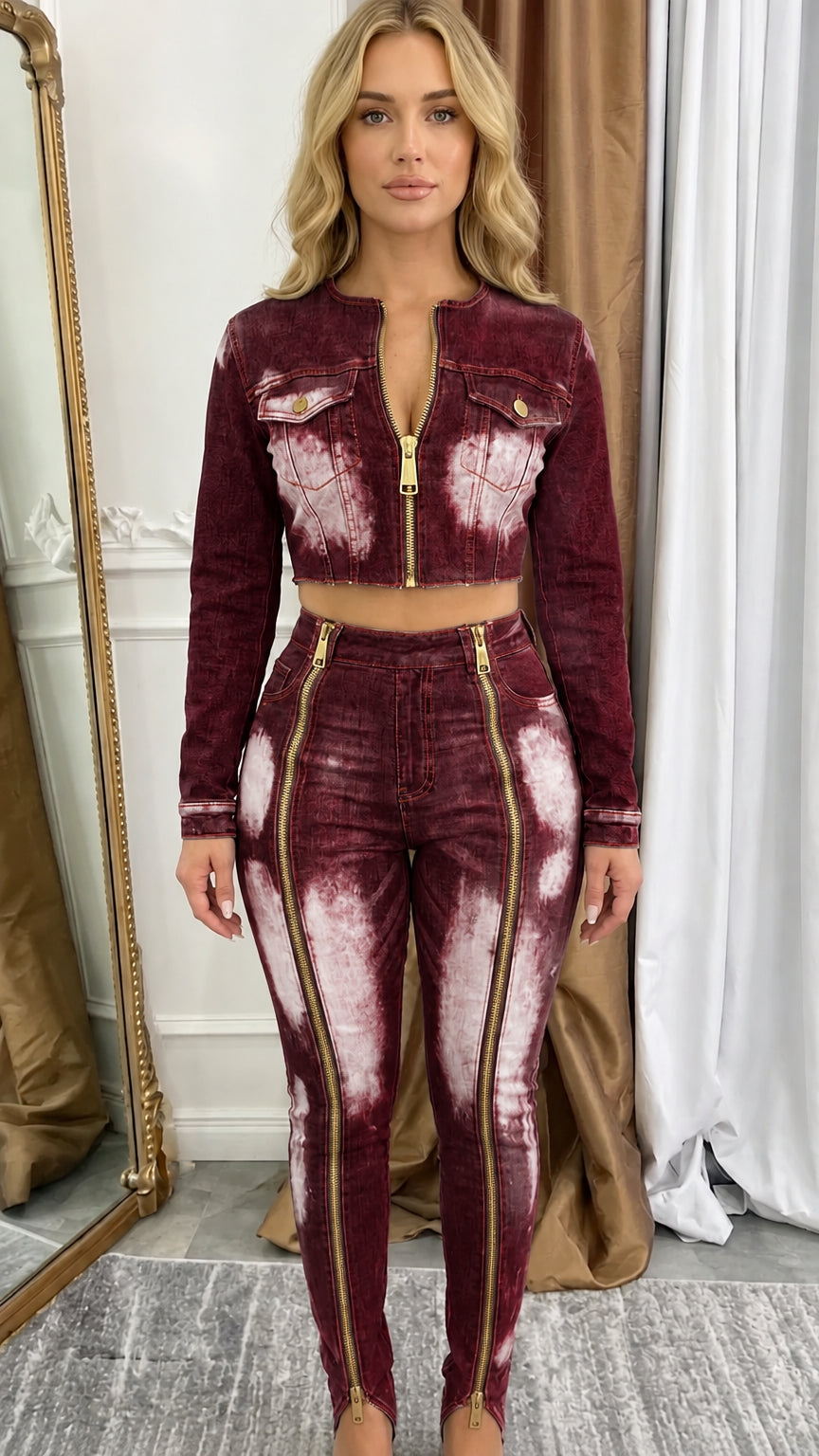 Model wearing burgundy acid wash cropped denim jacket and front zip skinny pants set