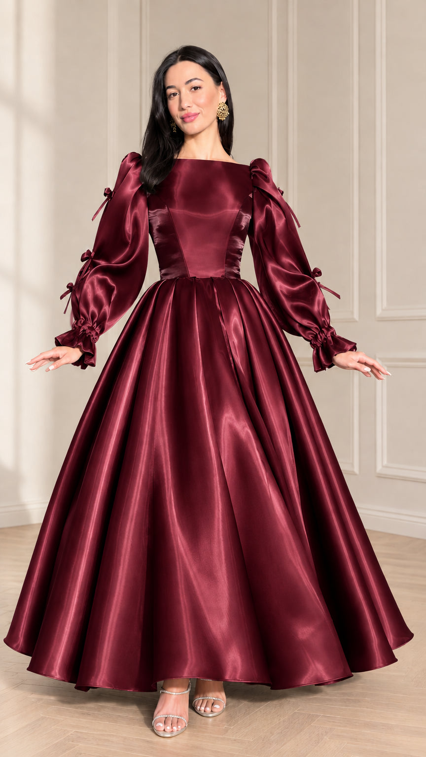 Front full-length view of burgundy red satin ball gown with puff sleeves