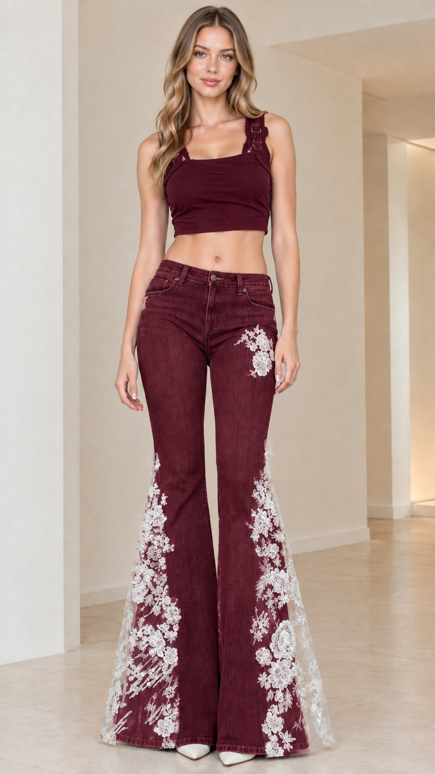 Front view of Burgundy wine red flare jeans with white floral lace inserts