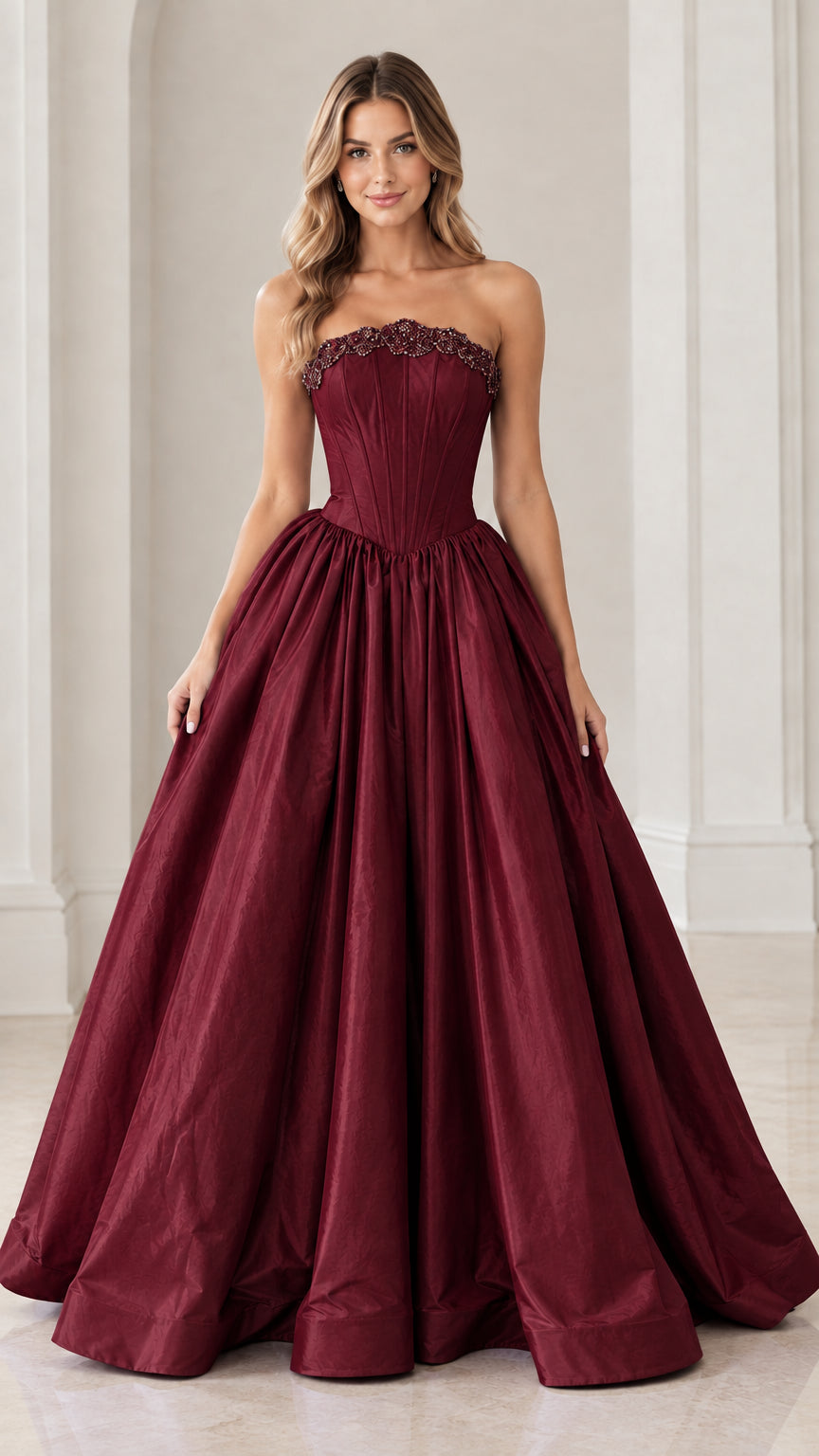 Model wearing rich burgundy wine red strapless beaded corset ball gown