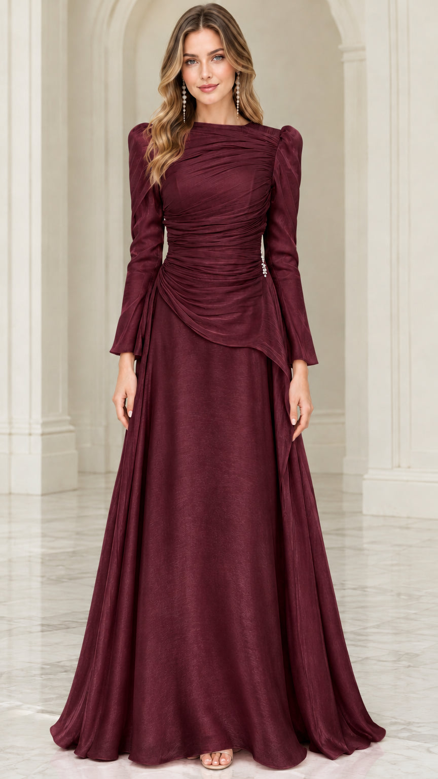 Front view of burgundy long sleeve ruched evening gown