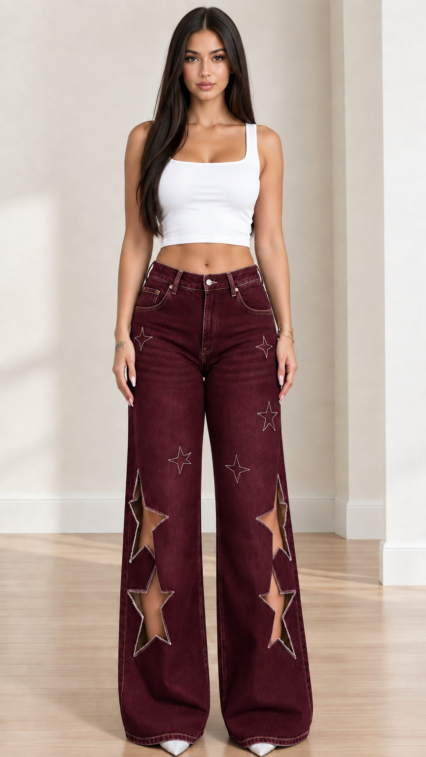 Front view of burgundy high-rise wide-leg denim pants with star cutouts
