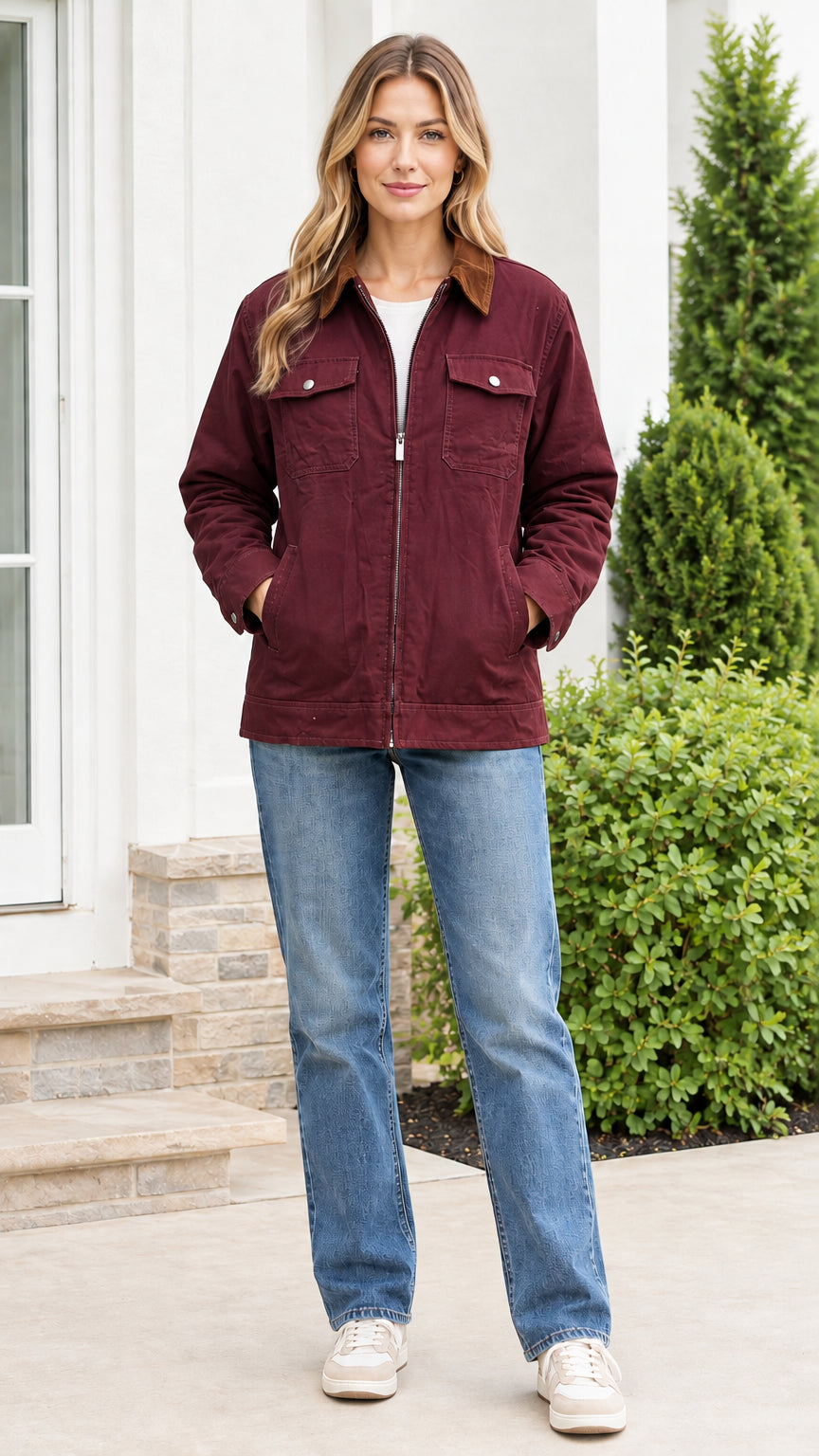 Front view of model wearing the burgundy canvas utility jacket with brown corduroy collar