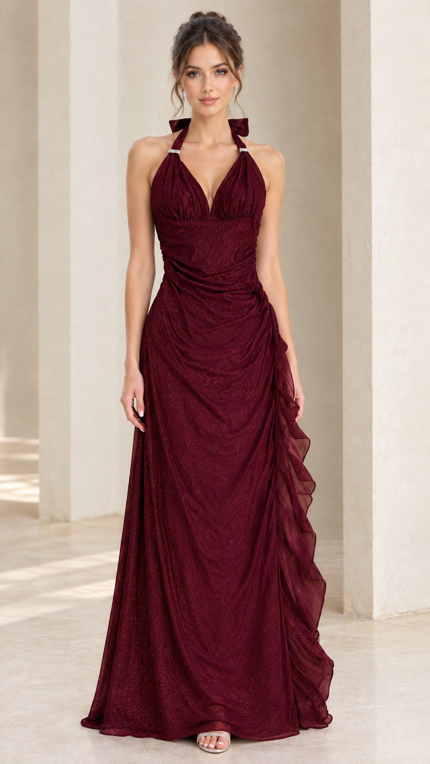 Front view of model wearing burgundy red ruched halter maxi dress
