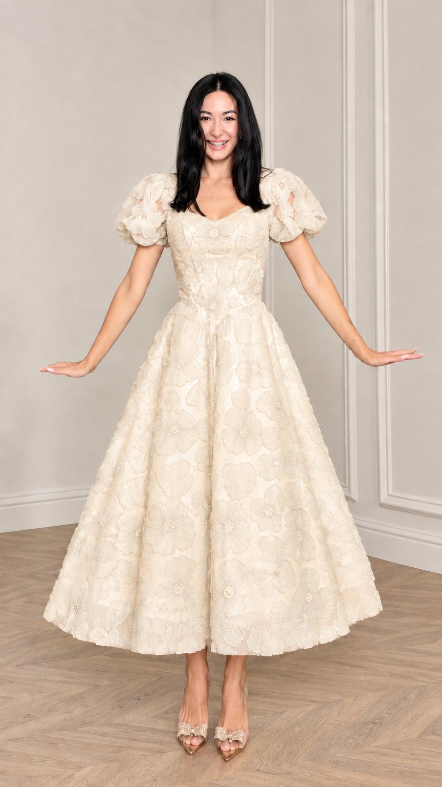 Front view of woman wearing Champagne cream floral applique puff sleeve midi dress