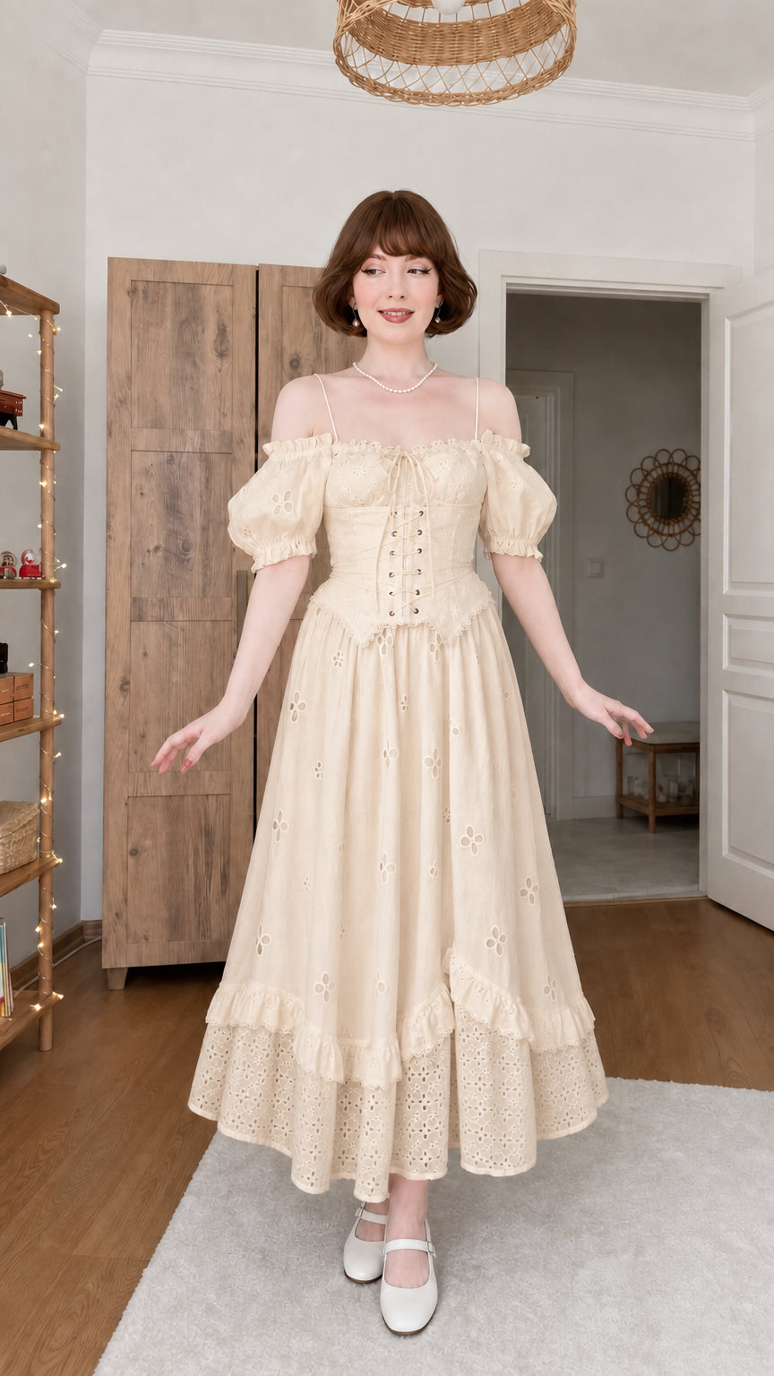 Woman wearing cream beige eyelet lace-up corset midi dress