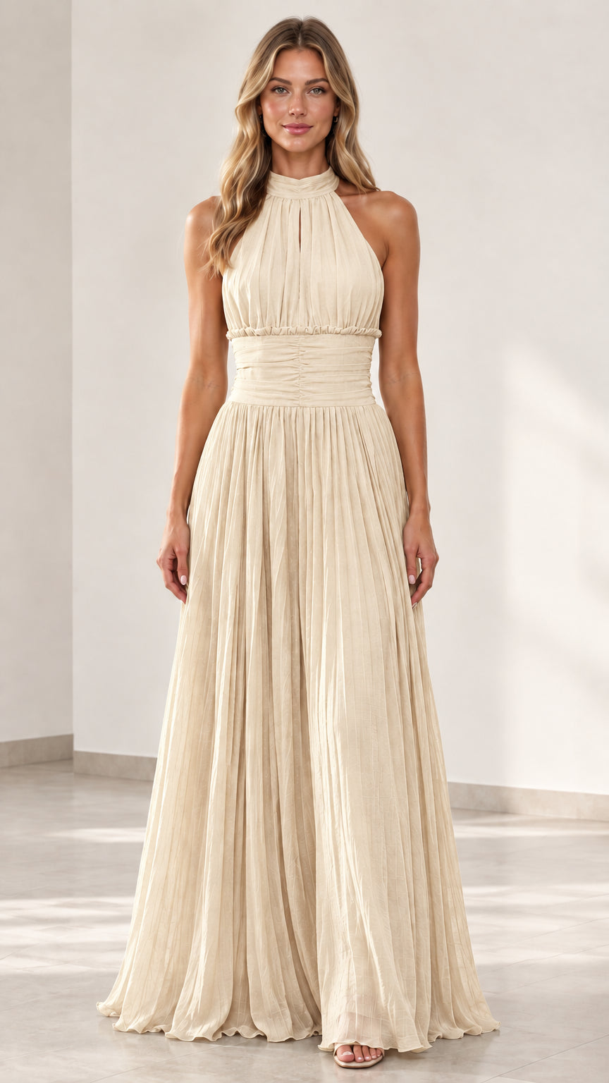 Front view of woman wearing champagne cream halter-neck evening dress