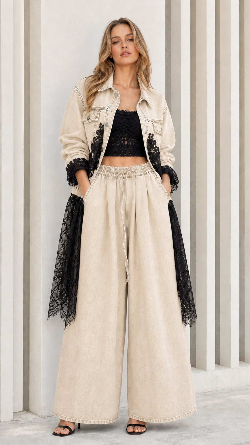 Model wearing beige denim jacket and wide-leg pants set with contrast black lace