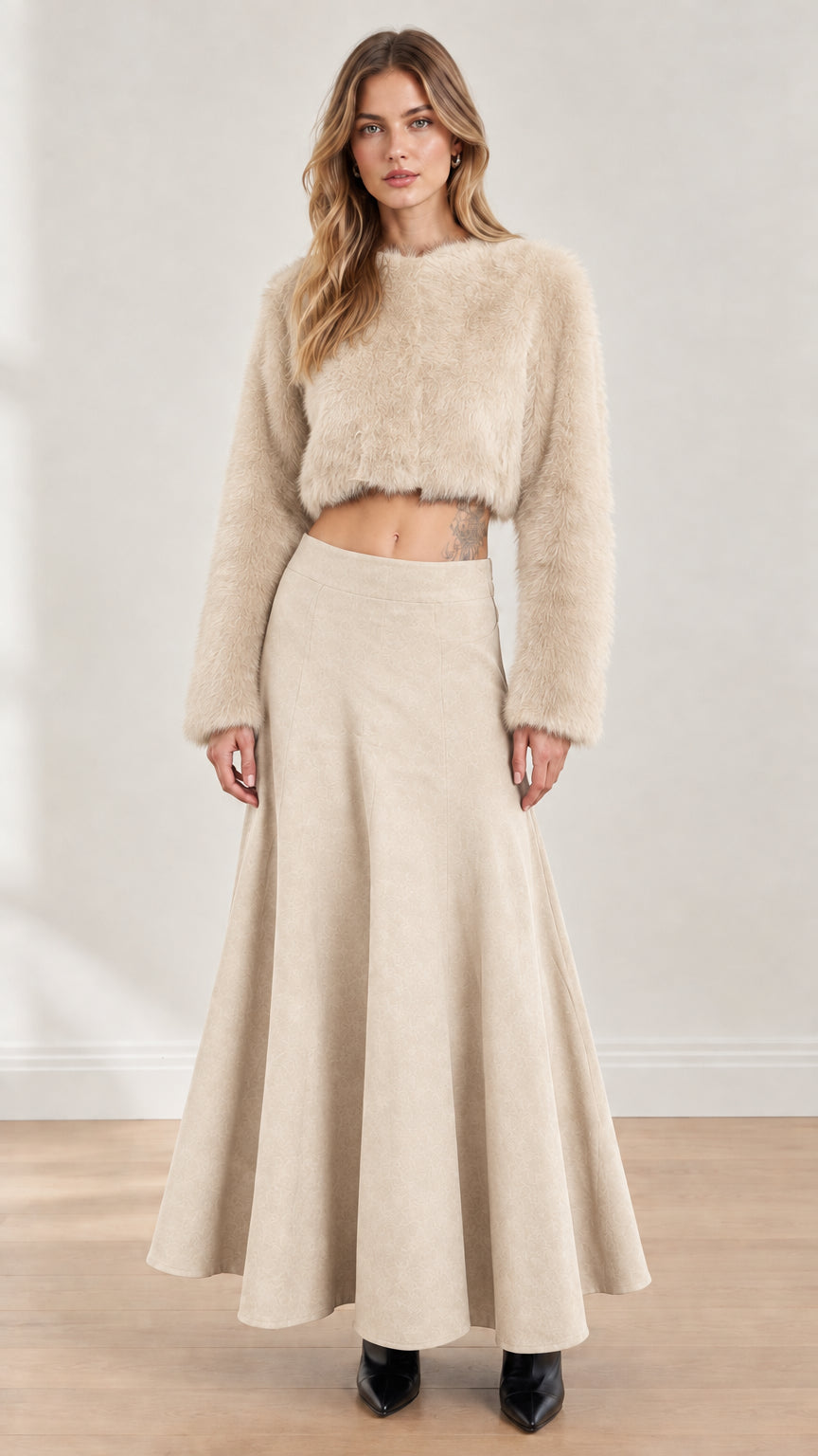 Model wearing beige cream fuzzy cropped top and matching flared maxi skirt set