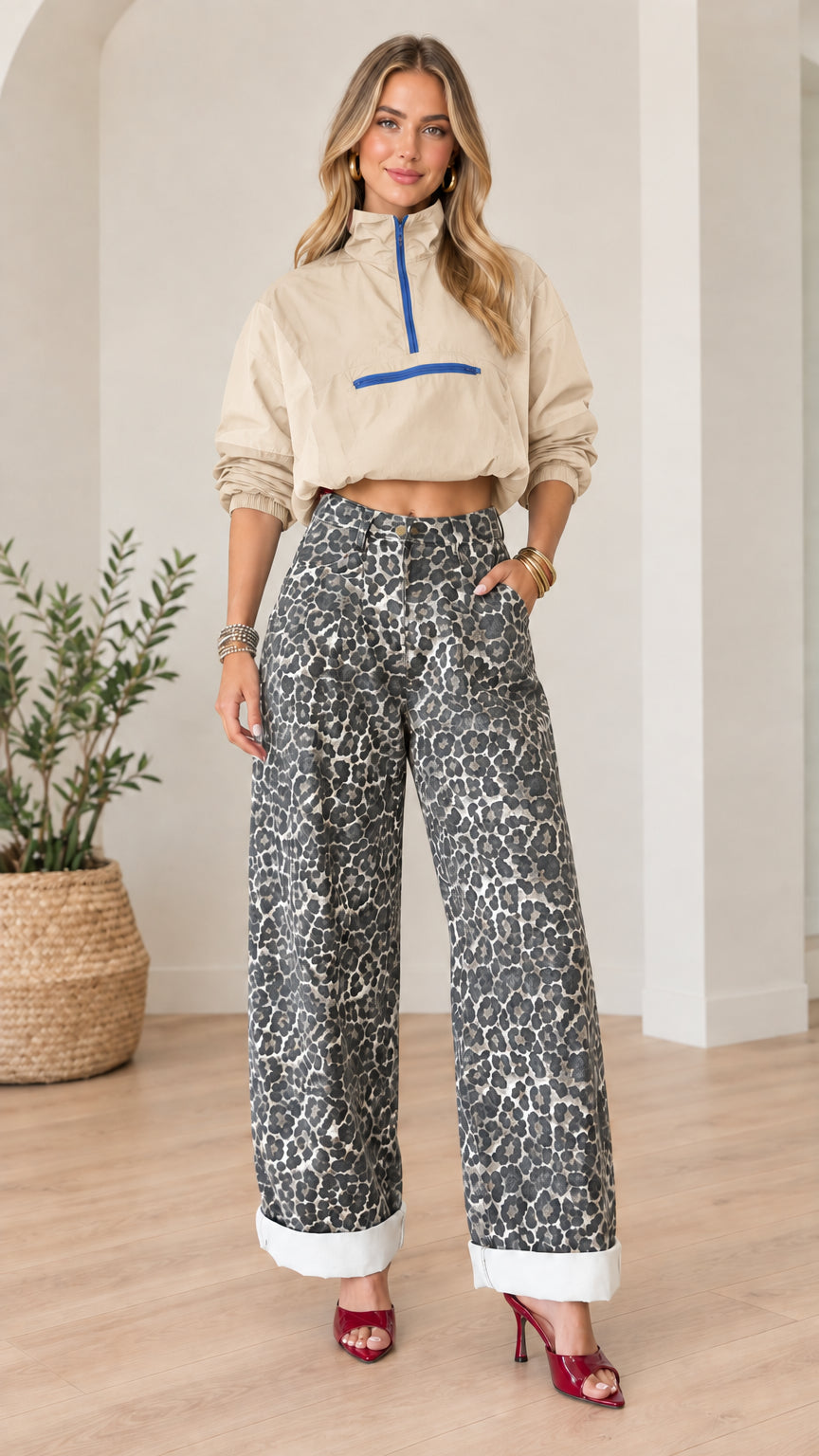 Front full view of beige khaki cropped half-zip windbreaker paired with leopard print wide-leg pants
