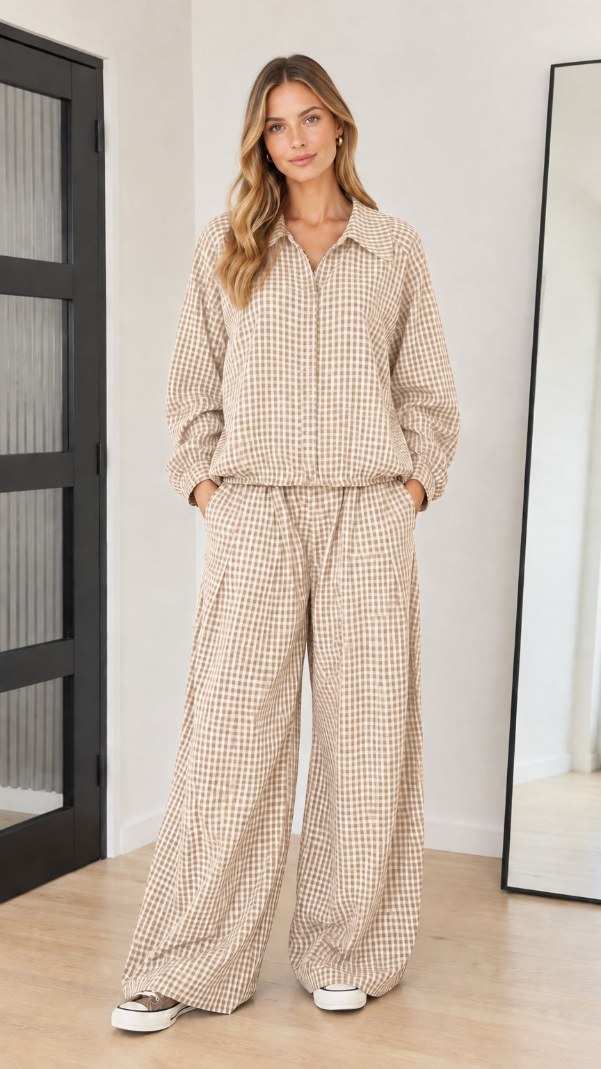 Front full-length view of model wearing beige khaki gingham collared top and wide-leg pants set