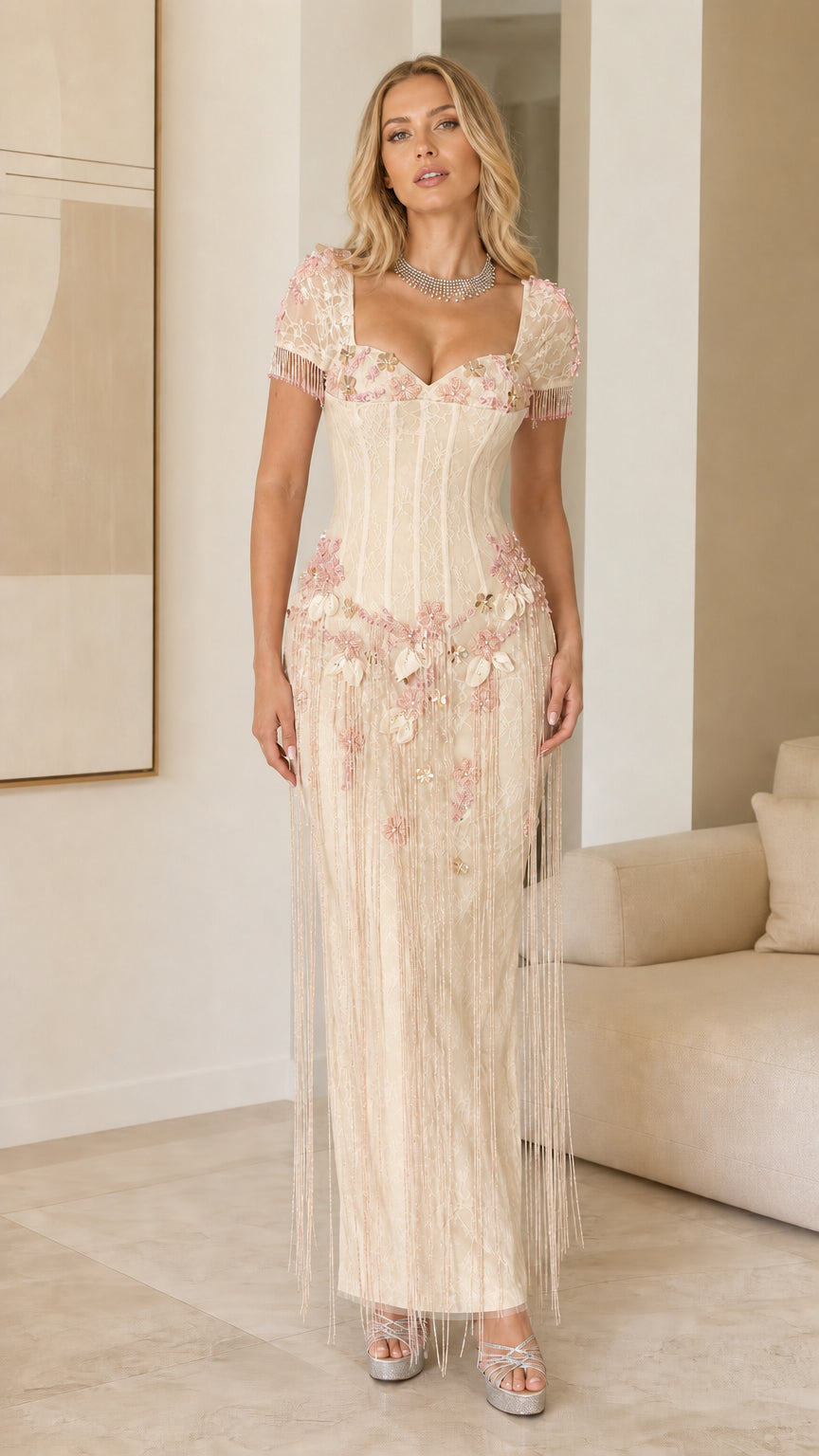 Model wearing Champagne cream beaded fringe corset formal dress