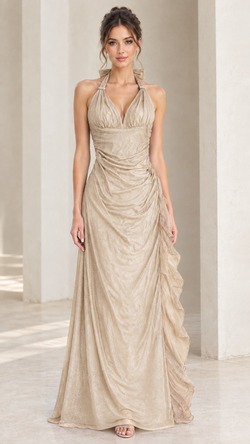 Front view of model wearing champagne gold shimmer halter formal gown