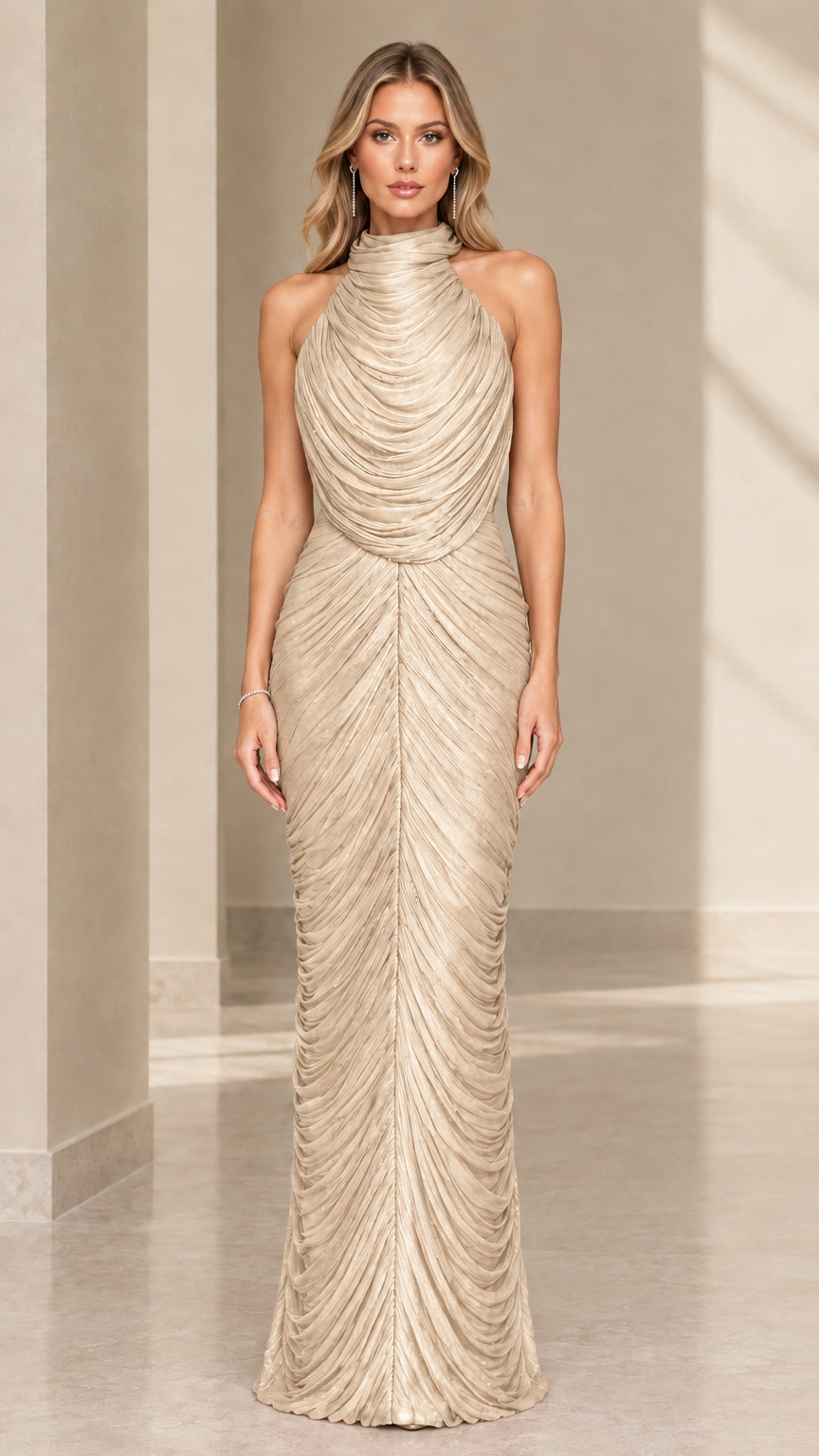 Front view of model wearing champagne beige pleated high-neck column maxi dress