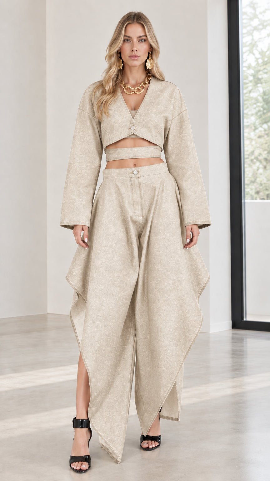 Full-body front view of beige cropped top and draped wide-leg pants set