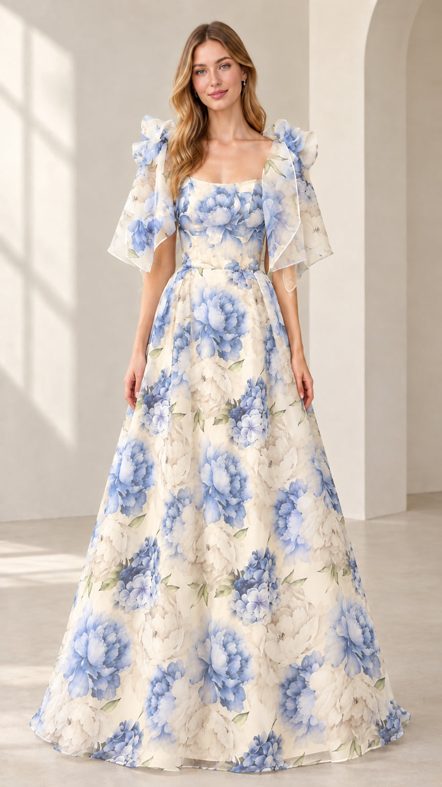 Model wearing champagne floral print flutter sleeve A-line maxi evening gown