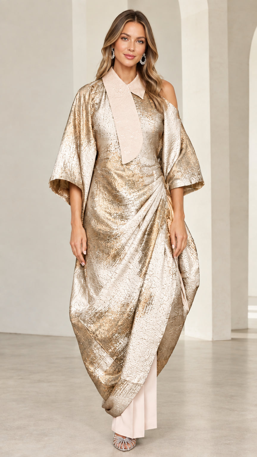 Front view of champagne gold metallic shimmer asymmetric kaftan and pant set