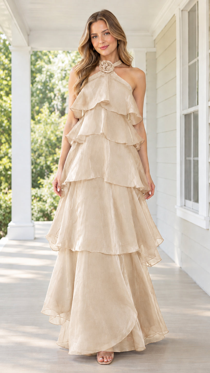 Front view of champagne beige tiered halter maxi dress