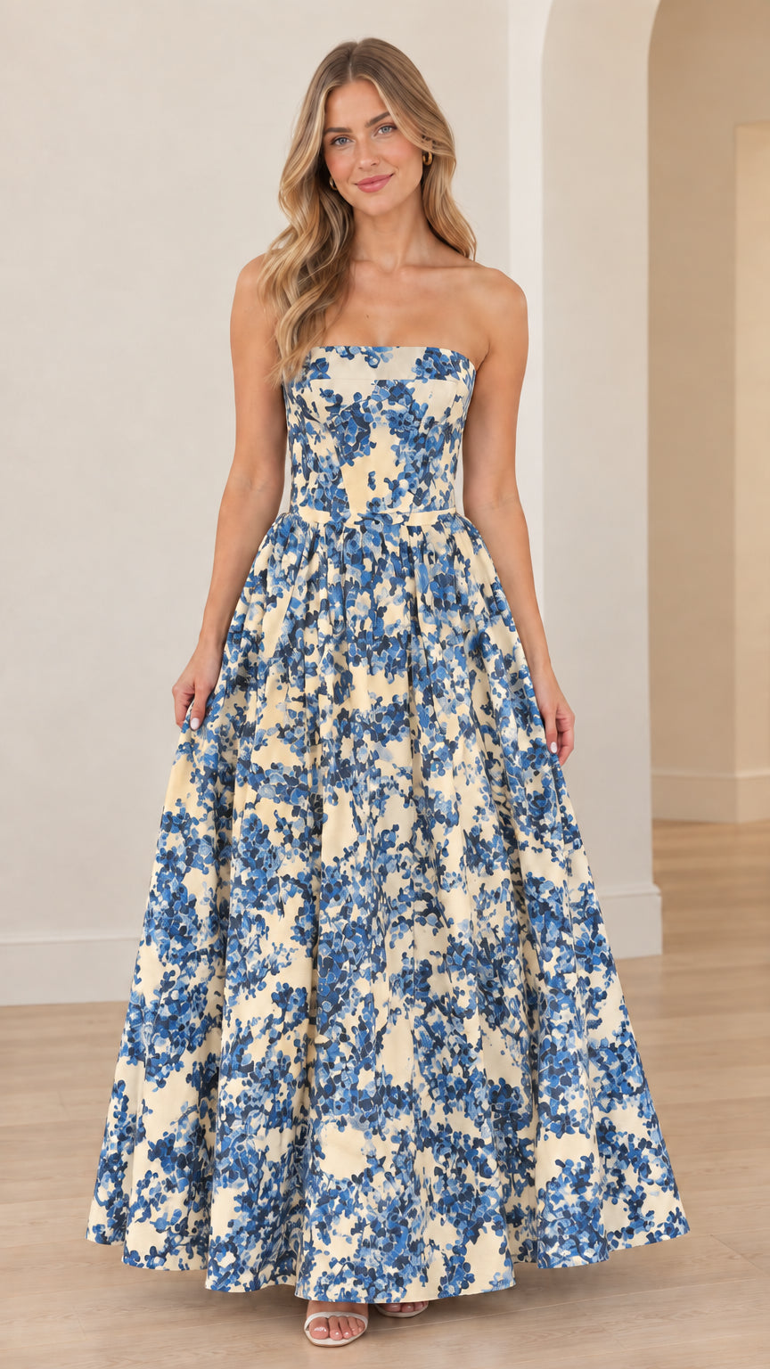 Full-length view of beige and blue floral strapless formal gown