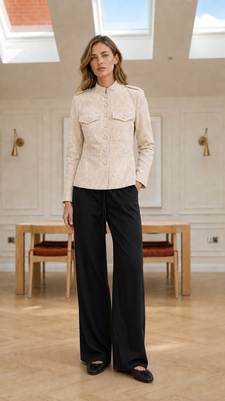 Model wearing cream beige faux suede button-up tailored jacket