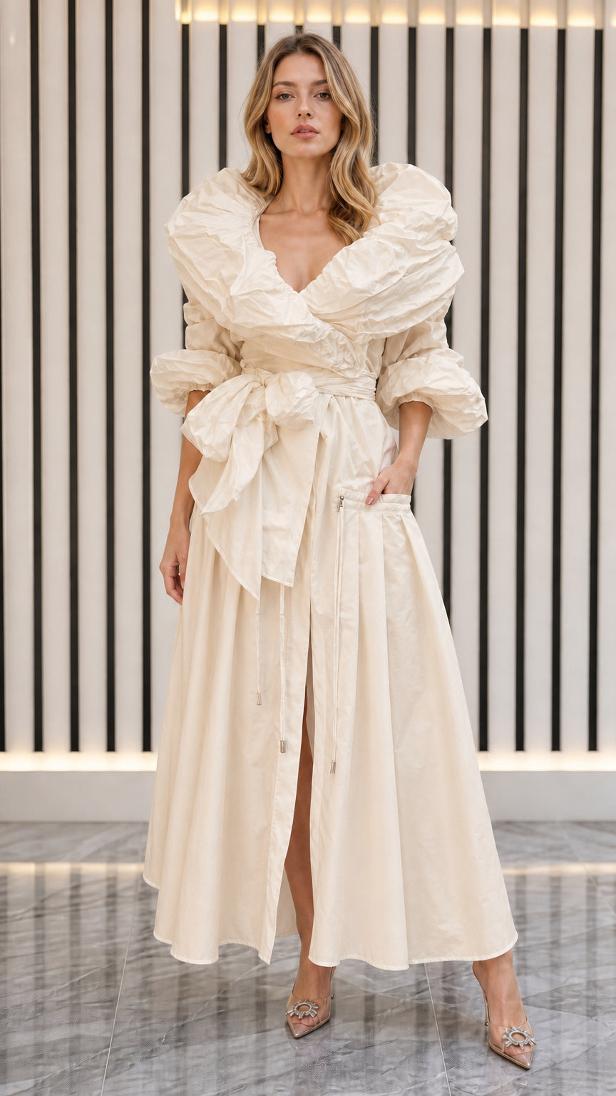 Model wearing cream champagne ruffled collar maxi dress