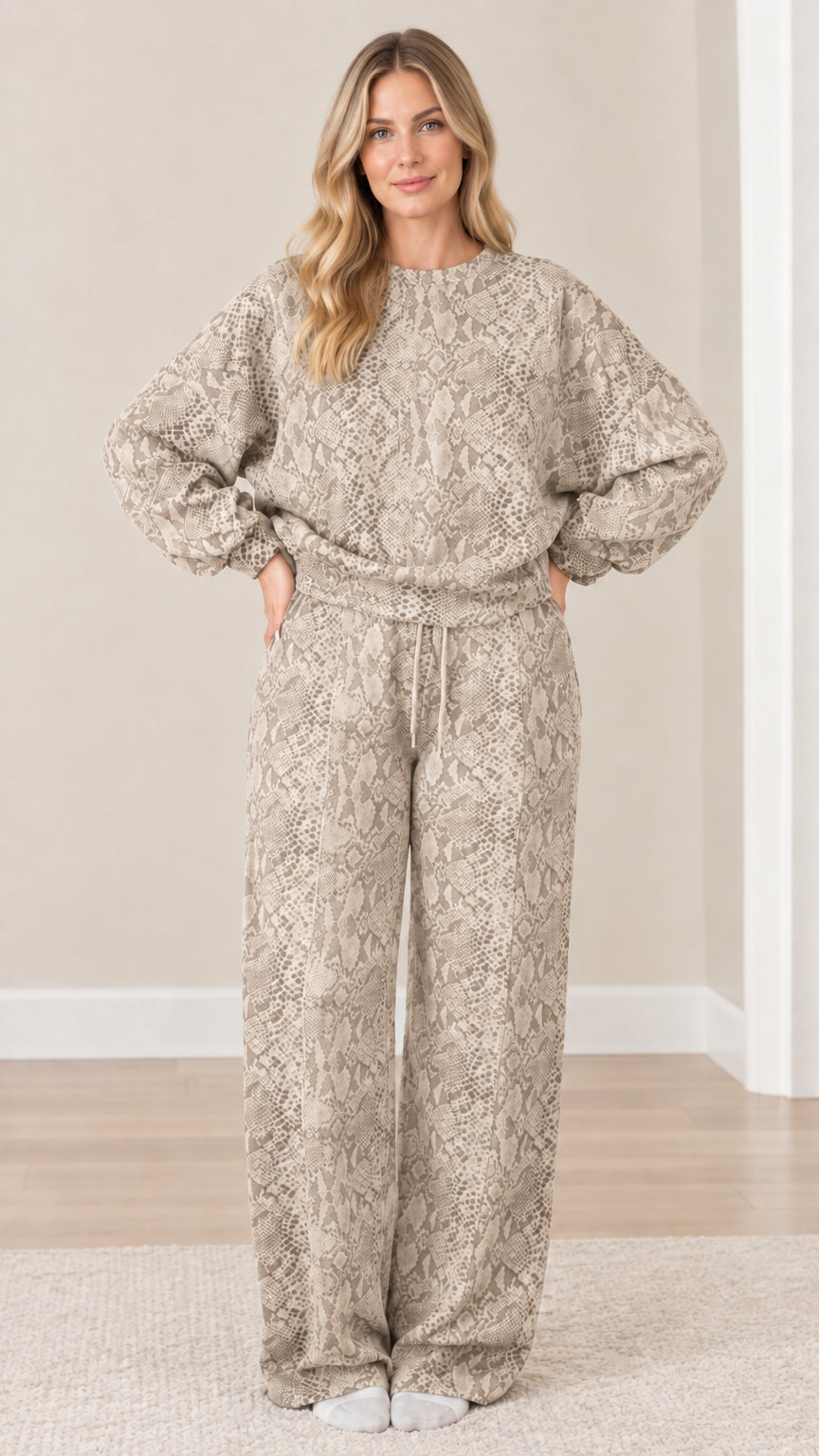 Front view of model wearing beige and taupe snakeskin print two-piece loungewear set
