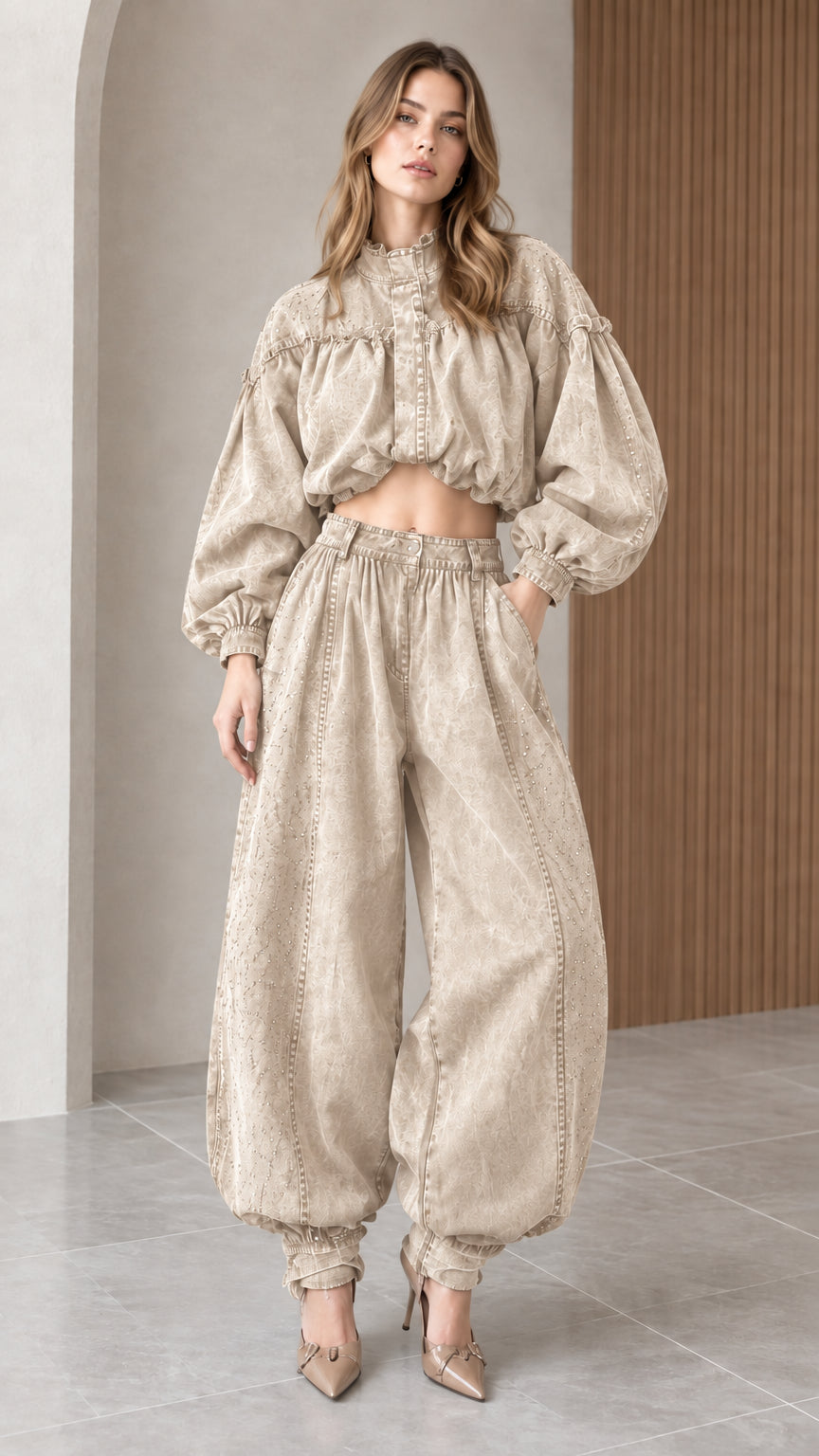 Front full-length view of the two-piece cropped top and balloon pants set in neutral beige